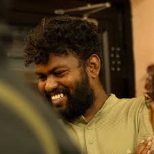கவிஞன் மொழி (Kavingan Mozhi)